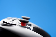 视频游戏控制器游戏垫特写镜头蓝色的背景与Copy-Space