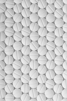 白色药片白色背景平板电脑模式宏药物摘要背景前视图
