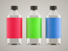 三个瓶为化学物质液体与色彩斑斓的贴纸在灰色背景