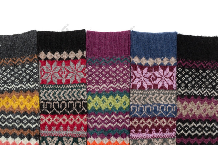 温暖的羊毛长袜针织与国家冬天模式白色背景