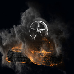 燃烧汽车轮子与烟