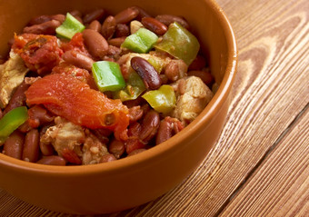 辣椒与肉美国英语简单的辣椒辣的炖肉包含辣椒辣椒肉通常牛肉西红柿而且经常豆子