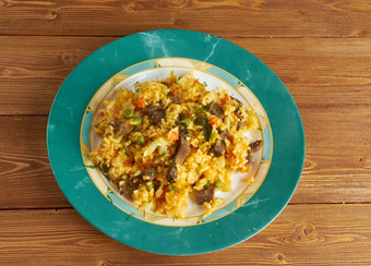 阿罗兹中国哥伦比亚炸大米与蔬菜而且肉盐料食物