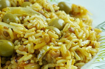 阿<strong>罗兹</strong>与甘杜勒斯大米鸽子豌豆煮熟的能与波多黎各Rican-style受欢迎的在拉丁美国而且的加勒比