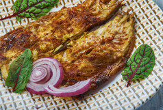 阿亚拉弗莱鲭鱼粗粒小麦粉弗莱喀拉拉邦风格厨房传统的各种各样的菜前视图