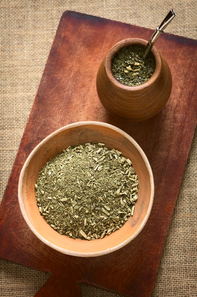 南美国耶尔巴伴侣伴侣茶干叶子粘土碗与木伴图片