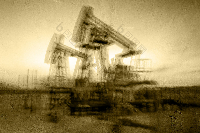 工作石油泵杰克石油场变形混凝土难看的东西模糊运动概念石油和气体行业健美的乌贼石油和气体行业背景