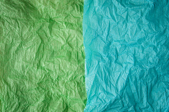 皱巴巴的多色的真正的色彩斑斓的纸表纹理背景绿色<strong>青色</strong>多色的皱巴巴的真正的生动的纸表纹理背景绿色<strong>青色</strong>