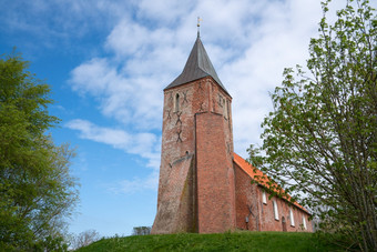 老教堂<strong>西风</strong>对蓝色的天空北Frisia德国