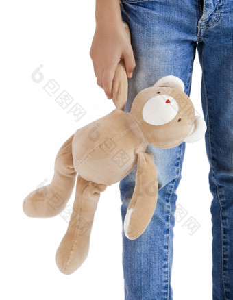小孩子独自一人与她的泰迪熊孤立的白色