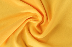 新皱纹纺织织物黄色的颜色