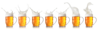 飞溅泡沫光啤酒杯子孤立的白色背景集合集飞溅泡沫光啤酒杯子
