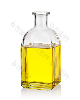 黄色的石油玻璃瓶没有软木塞孤立的白色背景黄色的石油玻璃瓶
