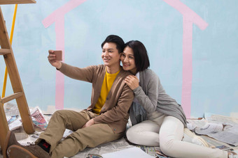 年轻夫妇拍照房地产幸福中国人高清摄影