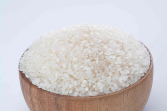 白背景下的一碗大米粮食氛围摄影