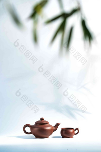 竹叶下的茶壶摄影高质量图片
