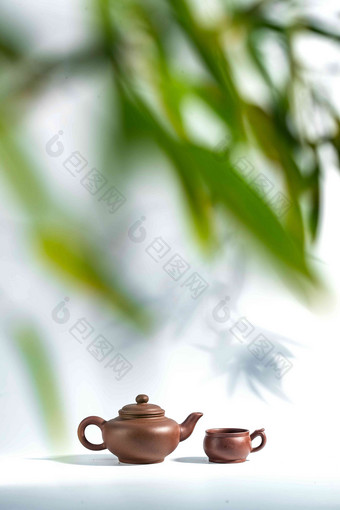 竹叶下的茶壶饮食写实素材