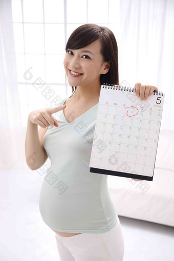 孕妇拿着日历牌<strong>时尚</strong>高质量镜头