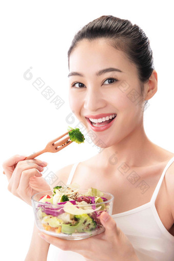 青年女人吃沙拉