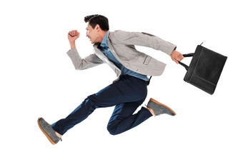 拿手提包奔跑的青年商务男士上下班高端图片