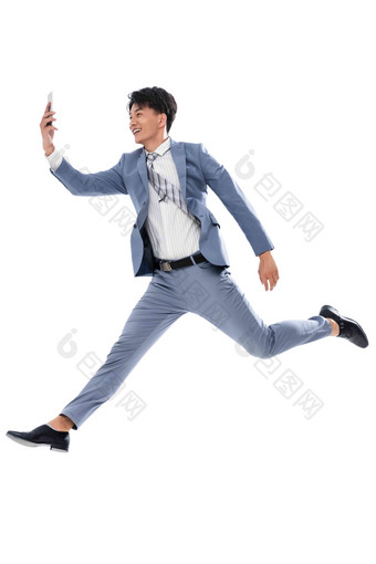 拿着手机奔跑跳跃的商务男士手机高质量图片