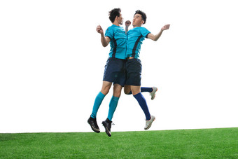足球运动员庆祝获胜东方人氛围摄影