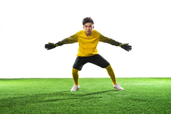 守门员站在<strong>足球</strong>场上运动手套氛围摄影图