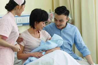 护士和新生儿的父母新生儿高端摄影