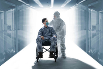 医务工作者推着坐轮椅的患者彩色图片清晰摄影图