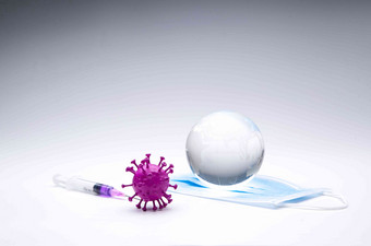 注射器地球模型口罩病毒球体照片