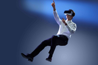 戴VR眼镜男士人工智能自动化区块链高端摄影图