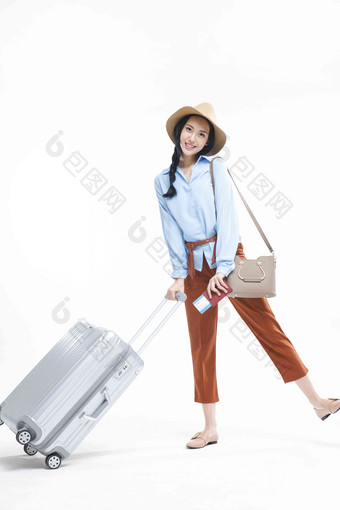青年女性旅游行李白色背景高端相片