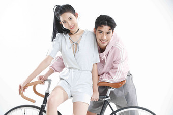 青年骑自行车东亚大半身青年女人清晰摄影图
