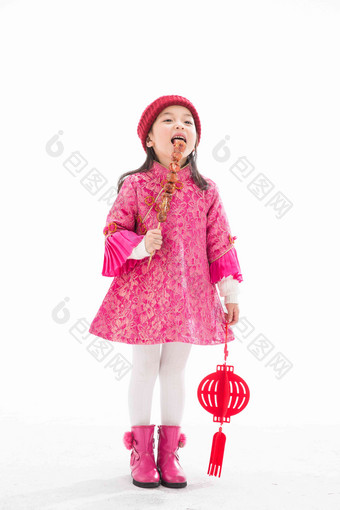欢乐的小女孩吃糖葫芦传统服装影相