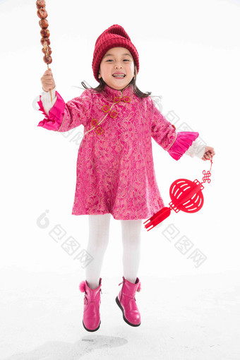 欢乐的小女孩吃糖葫芦兴奋照片