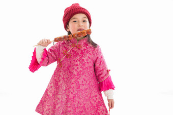 欢乐的小女孩吃糖葫芦东亚高质量相片