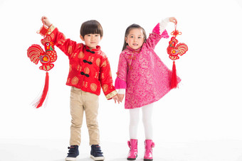 可爱的孩子庆祝新年中国结高清摄影
