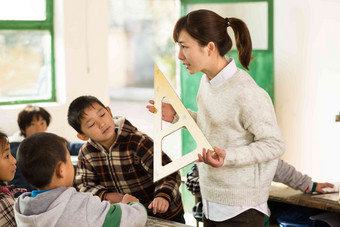 乡村女教师小学生桌子贫穷摄影清晰摄影