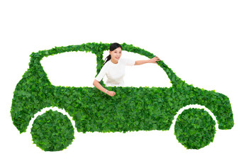 青年商务女士驾驶绿色<strong>环保</strong>汽车出行正装写实图片