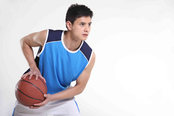 东方青年男子打篮球决心氛围摄影