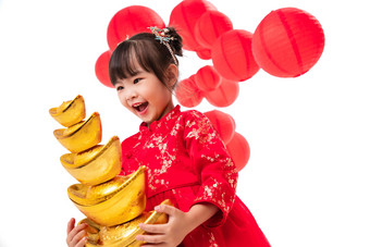 可爱的小女孩抱着一摞金元宝新年图片
