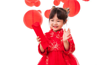 快乐的小女孩拿着红包可爱的照片