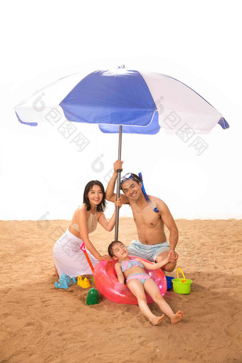 一家人海滩玩耍女孩生活方式照片