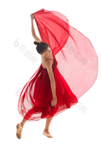 穿红色裙子跳<strong>芭蕾舞</strong>的青年女人红色氛围素材