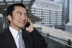 中国在香港香港业务男人。移动电话站人行桥关闭