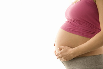 一边视图上腹部怀孕了女人手持有肚子白色背景