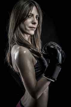 战斗机强大的女人运动员拳击手套