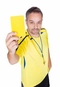 足球裁判显示黄色的卡