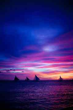 难以置信的美丽的日落帆船地平线长滩岛岛