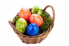 篮子明亮彩色复活节鸡蛋